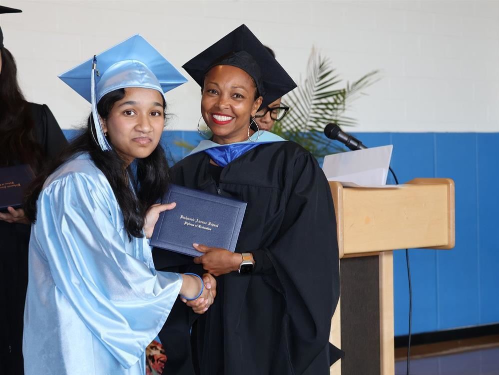 Principal Shontai Nicholson Harris and Valedictorian Umaiza Amirah
