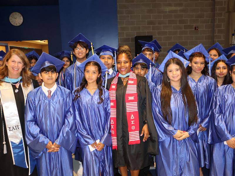 Sovereign Avenue School Principal Nicole Wlliams poses with the class of 2024