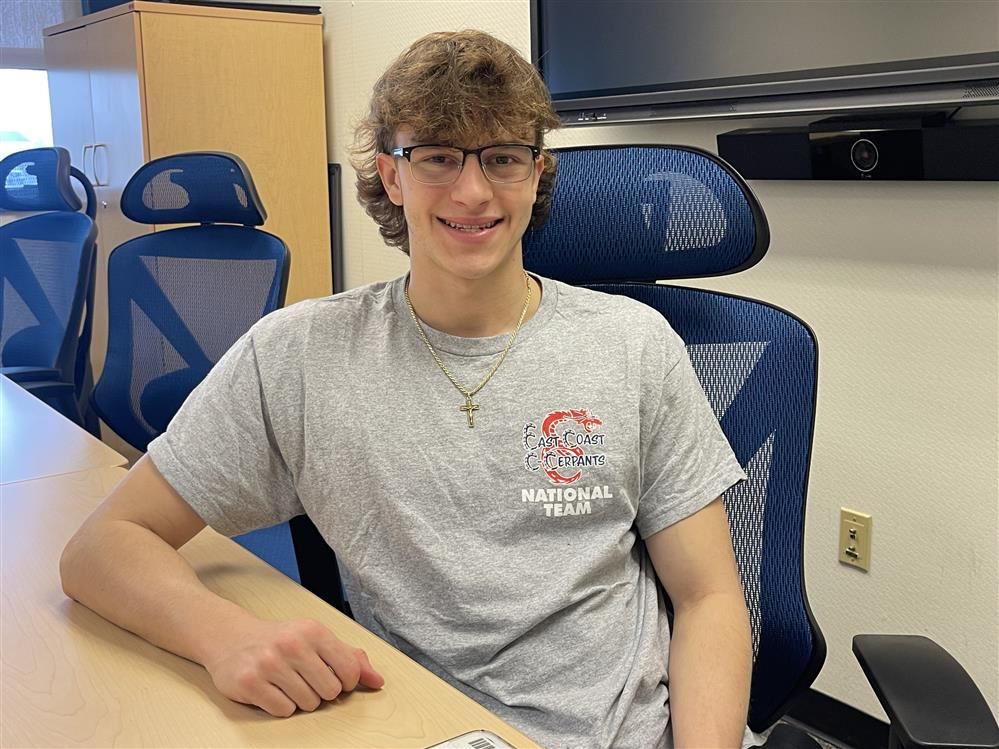  Atlantic City High School State Champion Swimmer James Haney wears his East Coast C-Serpants shirt.