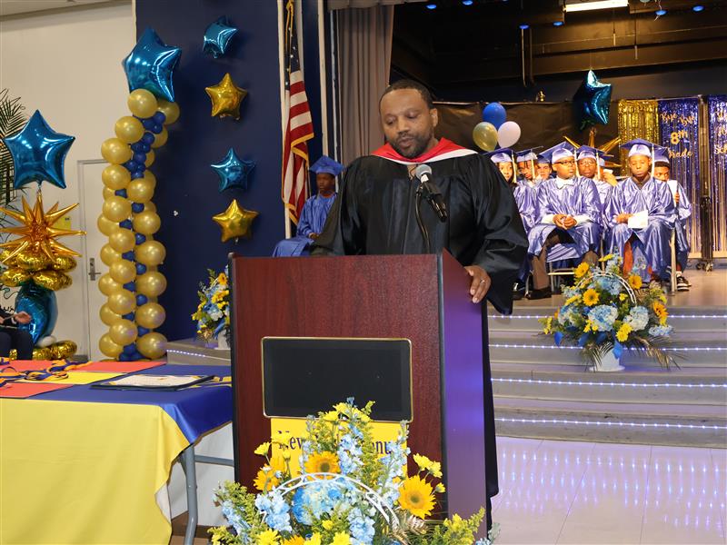 Principal Kendall Williams at podium