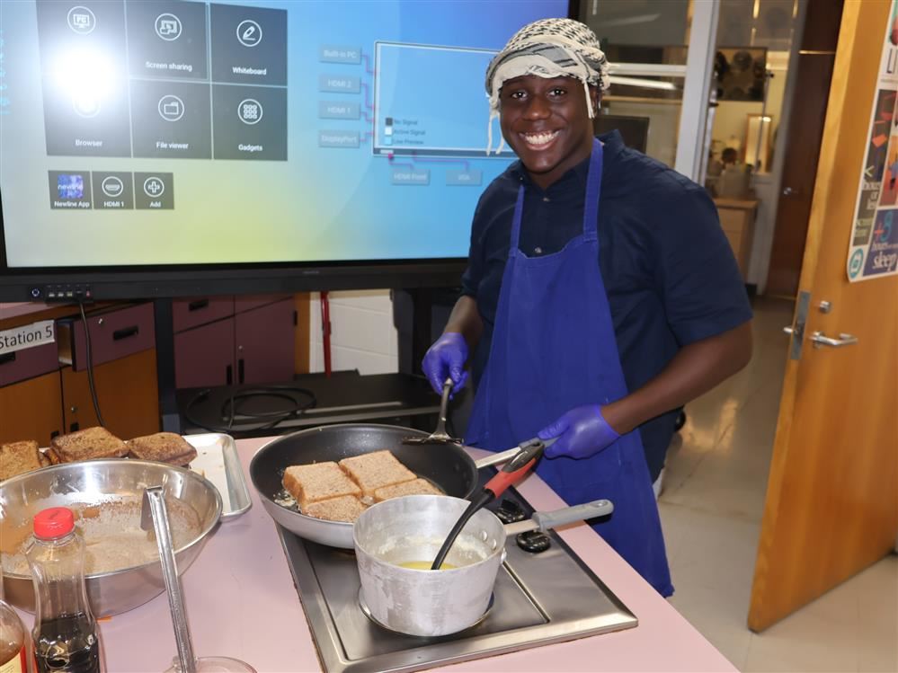 Students learn to make breakfast in culinary arts class.