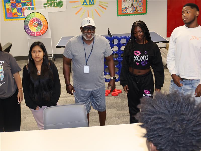 Eugene Allen helps students learn character development.