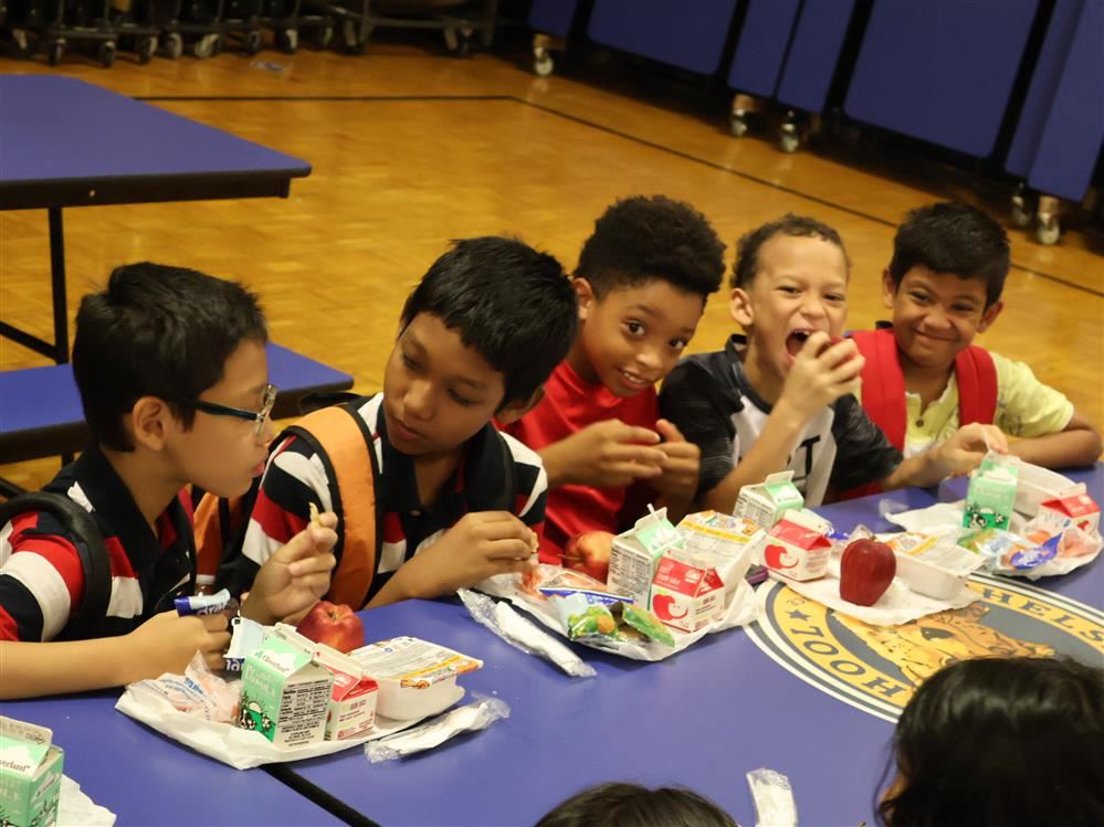 Students at Chelsea Heights School eat breakfast.