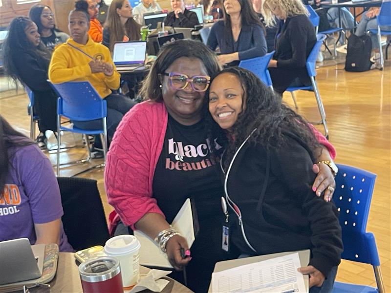 Brandi Debose and Richmond Ave. School Principal Shontai Nicholson-Harris.