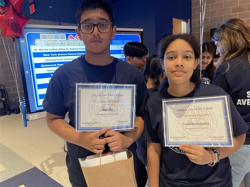 Ayatul Nur (Left) and Elianny Ramos-Sanchez (R) collected the prizes.