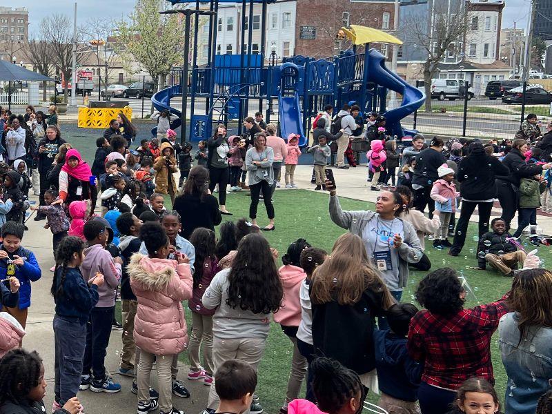 Pennsylvania Avenue School Students Blow Bubbles for Autism Awareness Month.