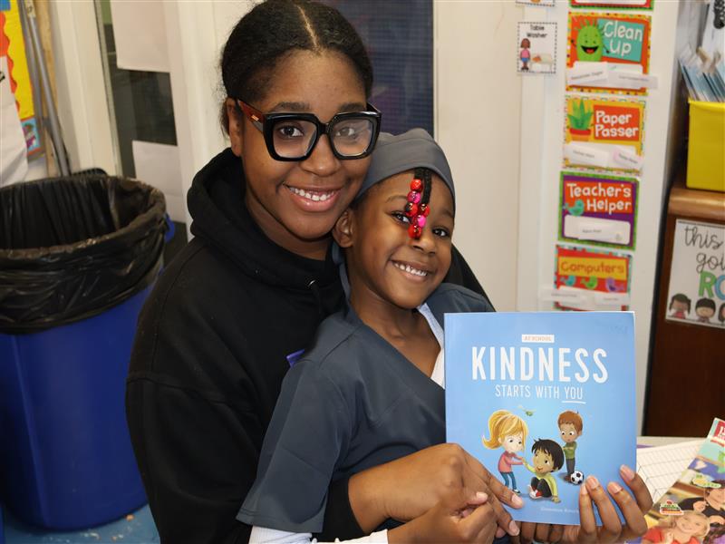 Anija Ford read to her daughter Kemani Roberts' class at Chelsea Heights School