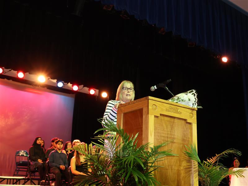 Virginia Gormley speaks at ACHS National Honor Society Induction Ceremony