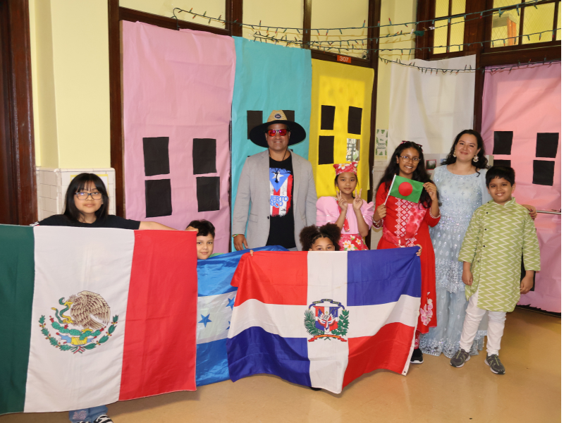 Principal Jason Grimes and students for Multicultural Day.